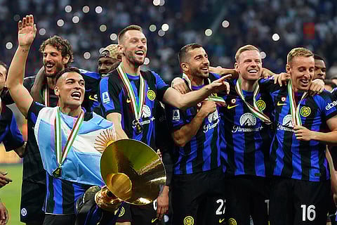 Lautaro Martinez celebrate with Serie A Trophy